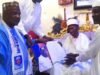 President Tinubu Presents Greeting Card To Emir of Gumel